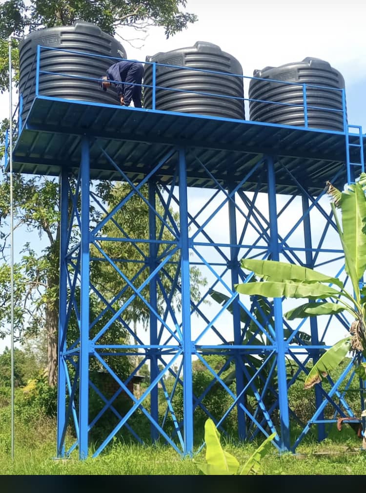 Blue community water tower Uganda